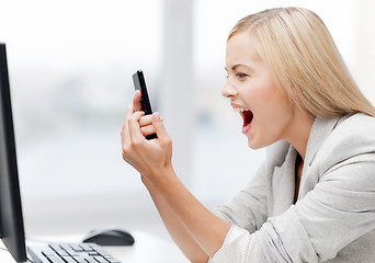 Image showing angry woman with phone