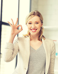 Image showing young woman showing ok sign