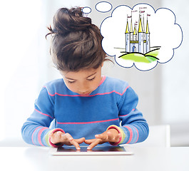 Image showing little girl with tablet pc at home