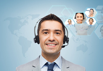 Image showing smiling businessman in headset