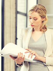 Image showing calm woman with documents