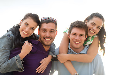 Image showing group of happy friends having fun outdoors