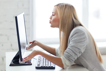 Image showing happy woman with laptop computer