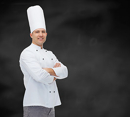 Image showing happy male chef cook with crossed hands