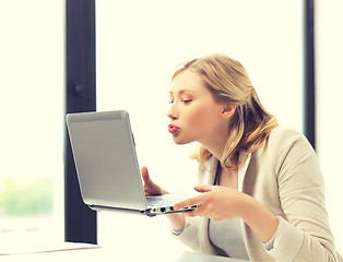 Image showing happy woman with laptop computer