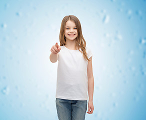 Image showing little girl in blank white t-shirt pointing at you