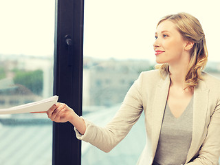 Image showing happy woman with documents