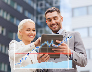 Image showing smiling businessmen with tablet pc outdoors