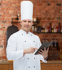 Image showing happy male chef cook holding tablet pc