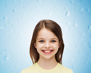 Image showing smiling little girl over white background