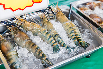 Image showing shrimps or seafood on ice at asian street market