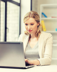 Image showing happy woman with laptop computer