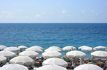 Image showing Beach with white umbrellas
