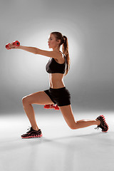 Image showing Sporty woman doing aerobic exercise 