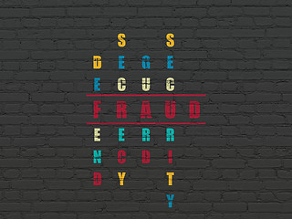 Image showing Privacy concept: word Fraud in solving Crossword Puzzle
