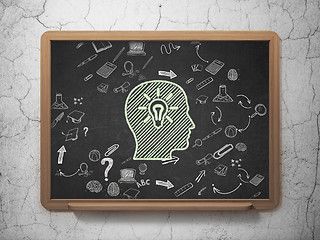 Image showing Education concept: Head With Light Bulb on School Board background