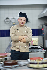 Image showing chef preparing desert cake in the kitchen