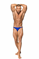 Image showing Attractive male body builder on white background