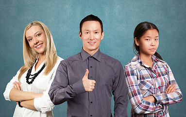 Image showing Asian team and businesswoman with crossed hands