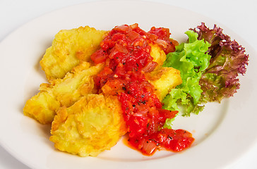 Image showing Fried battered fish fillet on white plate