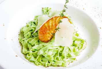 Image showing green pasta with grilled fish