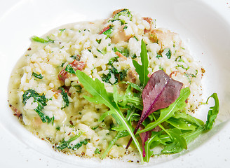 Image showing risotto with smoked meat, spinach, parmesan cheese 