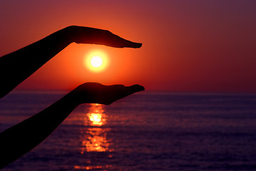 Image showing Holding the sun