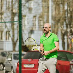 Image showing man play tennis outdoor