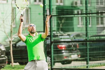 Image showing man play tennis outdoor