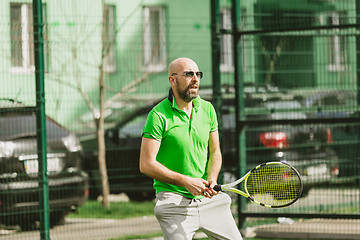 Image showing man play tennis outdoor