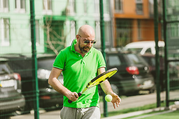 Image showing man play tennis outdoor