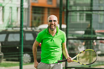 Image showing man play tennis outdoor