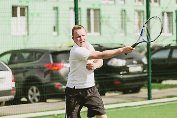 Image showing man play tennis outdoor