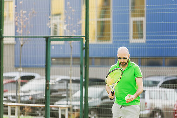 Image showing man play tennis outdoor