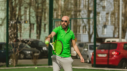 Image showing man play tennis outdoor