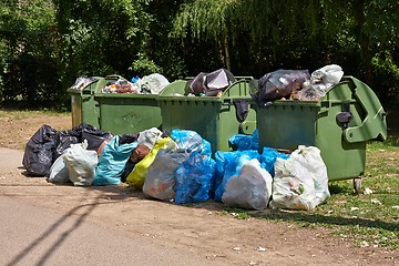 Image showing Garbage Containers Full, Overflowing