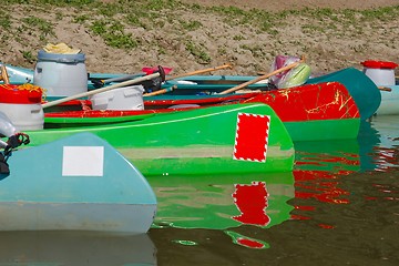 Image showing Canoes on the Riverside