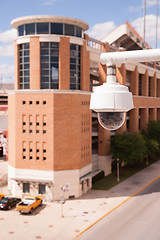 Image showing Video Security Camera Housings Mounted High on College Campus