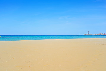 Image showing Sandy beach and blue sea and sky
