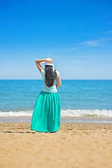 Image showing Brunette with long hair turned away