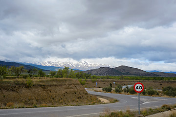 Image showing Zigzag road in Spain with snow mountains