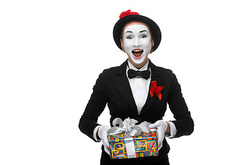 Image showing Mime as playful, joyful and excited woman with gift 