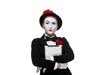 Image showing business woman in the image mime holding tablet PC