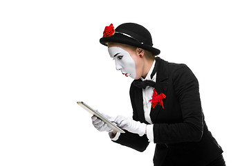 Image showing business woman in the image mime holding tablet PC