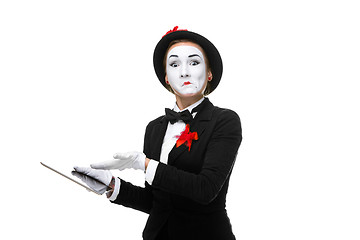 Image showing business woman in the image mime holding tablet PC