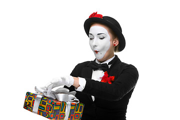 Image showing Mime as playful, joyful and excited woman with gift 