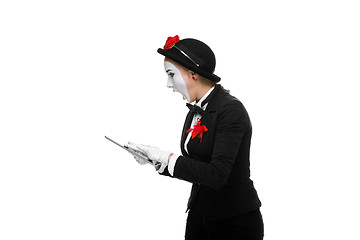 Image showing business woman in the image mime holding tablet PC