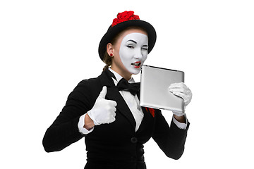 Image showing business woman in the image mime holding tablet PC