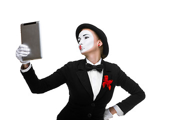 Image showing business woman in the image mime holding tablet PC