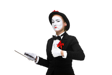 Image showing business woman in the image mime holding tablet PC
